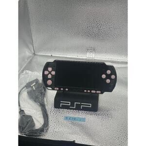 Pink & black psp 3000 w/charging adapter& new battery